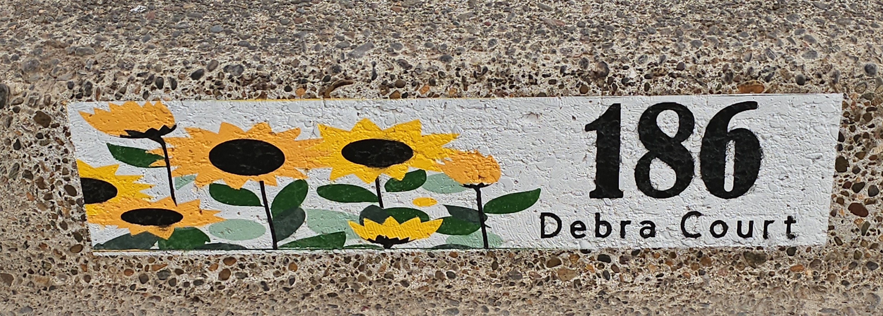 Beautifully painted curb after Lipstick My Curb treatment
